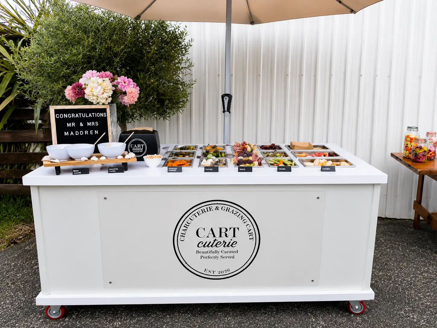 Close-up of curated grazing board at a coastal celebration